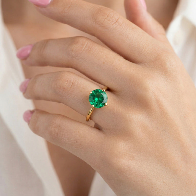 emerald birthstone ring in yellow gold finish — model view