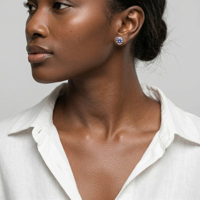 alexandrite birthstone stud earrings in white gold finish — model view