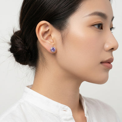 alexandrite birthstone stud earrings in white gold finish — model view