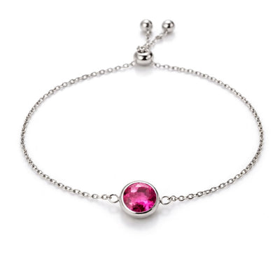 ruby birthstone bracelet in white gold finish — front view