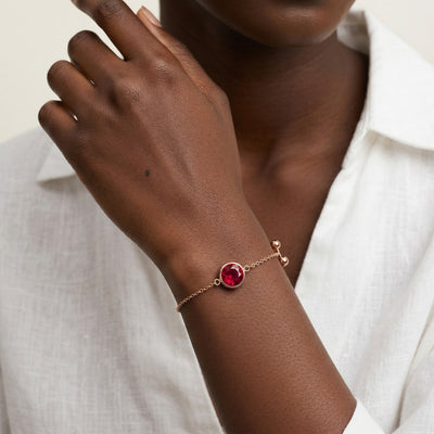 ruby birthstone bracelet in rose gold finish — model view