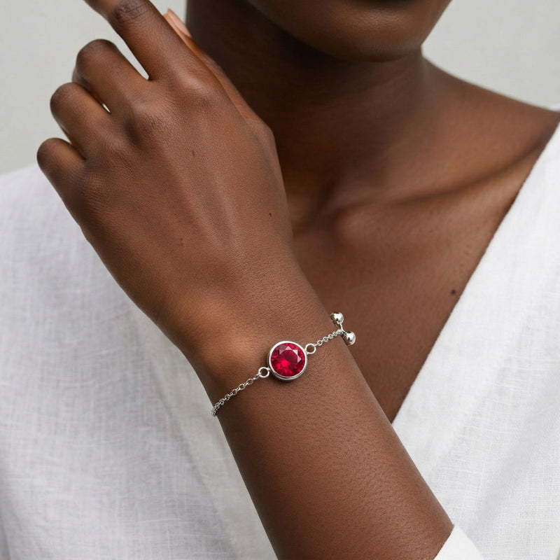 ruby birthstone bracelet in white gold finish — model view
