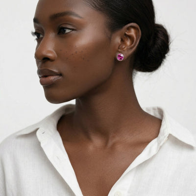 ruby birthstone stud earrings in white gold finish — model view