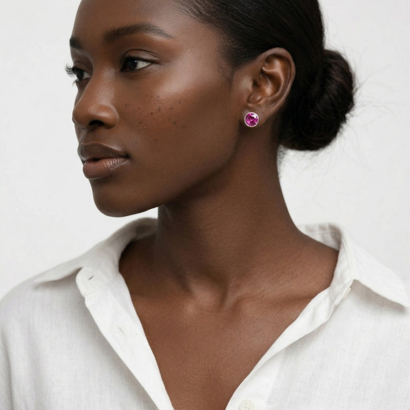 ruby birthstone stud earrings in white gold finish — model view