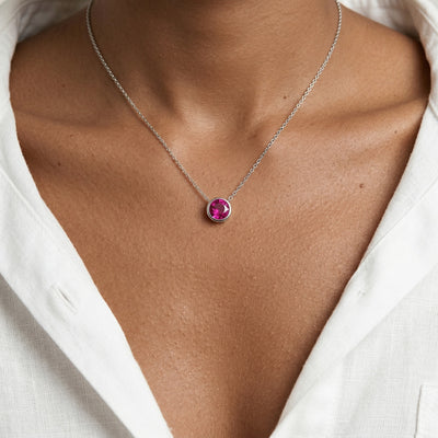 ruby birthstone necklace in white gold finish — model view