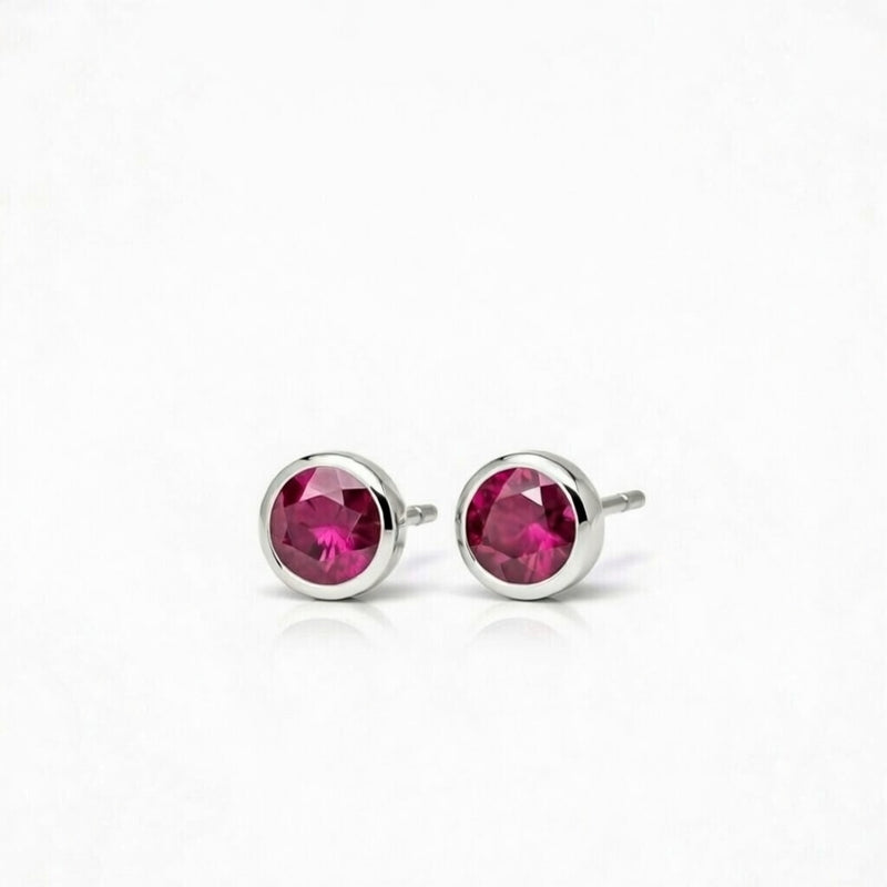 ruby birthstone stud earrings in white gold finish — side view