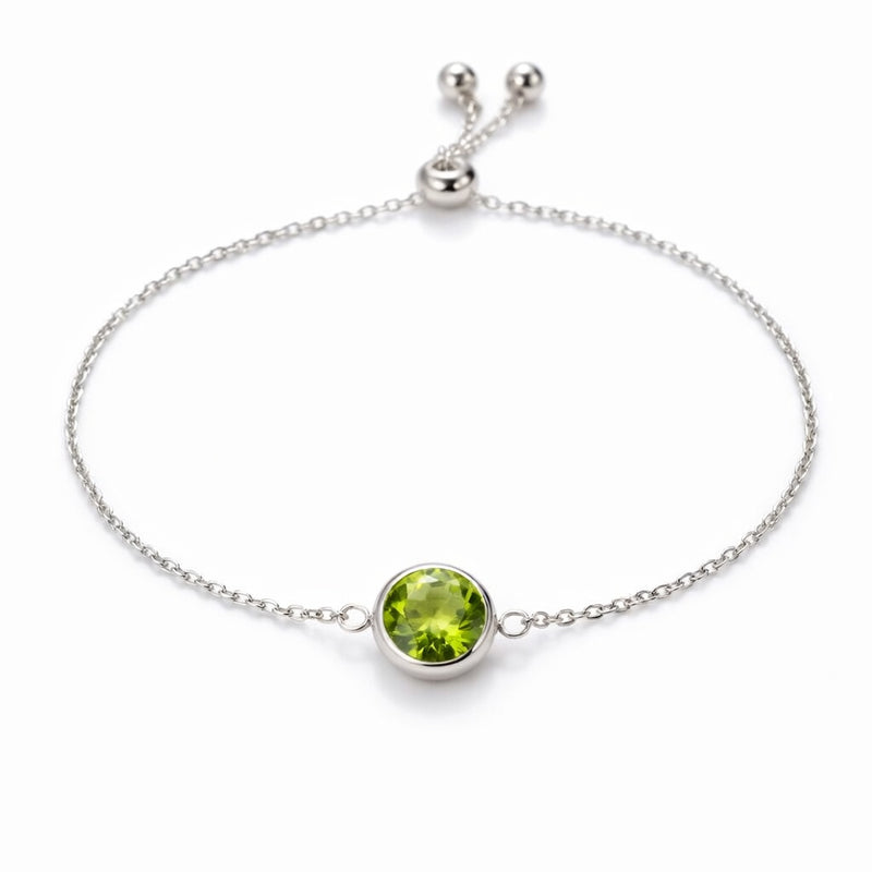 peridot birthstone bracelet in white gold finish — front view