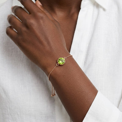 peridot birthstone bracelet in rose gold finish — model view