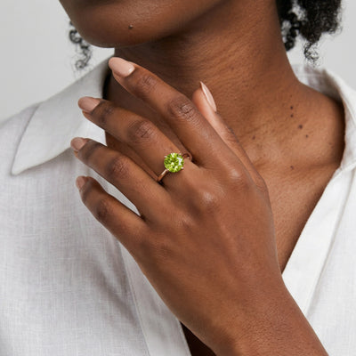 peridot birthstone ring in rose gold finish — model view