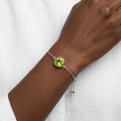 peridot birthstone bracelet in white gold finish — model view