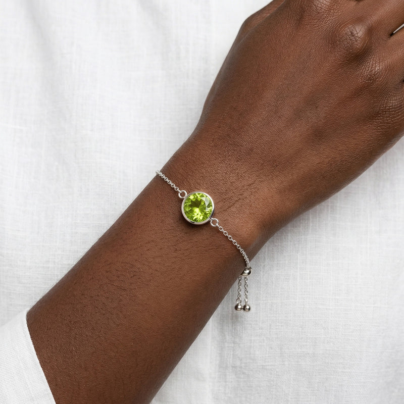 peridot birthstone bracelet in white gold finish — model view