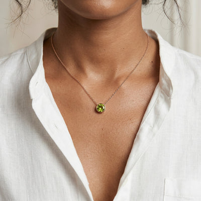 peridot birthstone necklace in rose gold finish — model view
