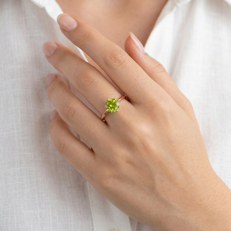 peridot birthstone ring in rose gold finish — model view