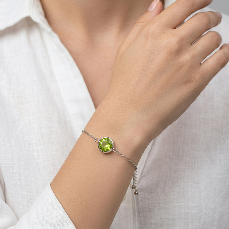 peridot birthstone bracelet in white gold finish — model view