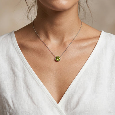 peridot birthstone necklace in white gold finish — model view