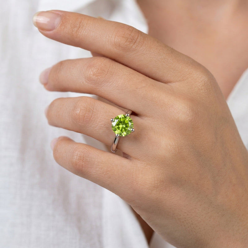 peridot birthstone ring in white gold finish — model view