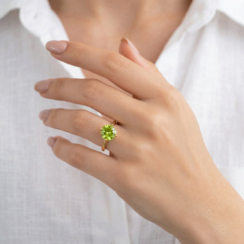 peridot birthstone ring in yellow gold finish — model view