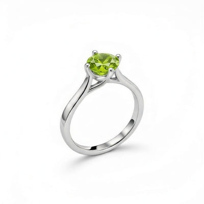 peridot birthstone ring in white gold finish — side view