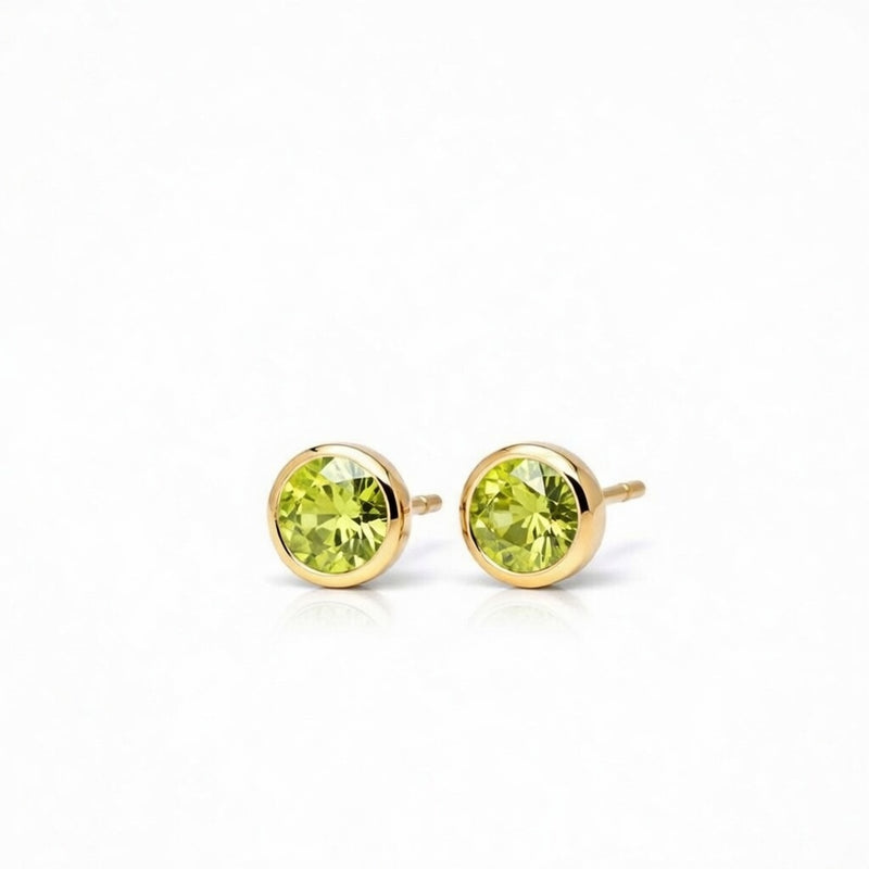 peridot birthstone stud earrings in yellow gold finish — side view