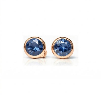 sapphire birthstone stud earrings in rose gold finish — front view