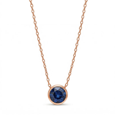 sapphire birthstone necklace in rose gold finish — front view