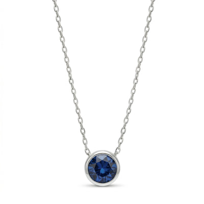 sapphire birthstone necklace in white gold finish — front view