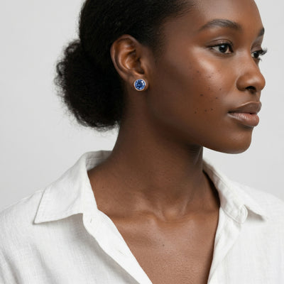 sapphire birthstone stud earrings in rose gold finish — model view