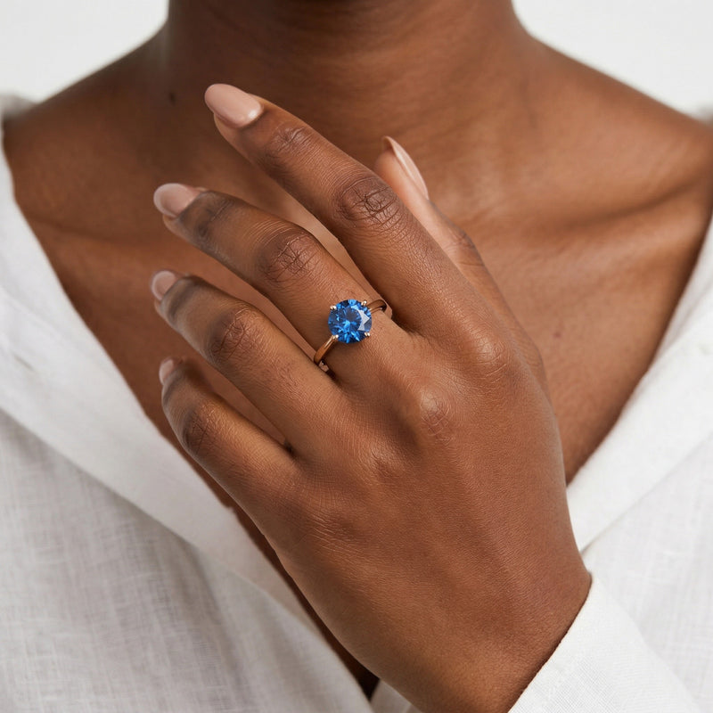 sapphire birthstone ring in rose gold finish — model view