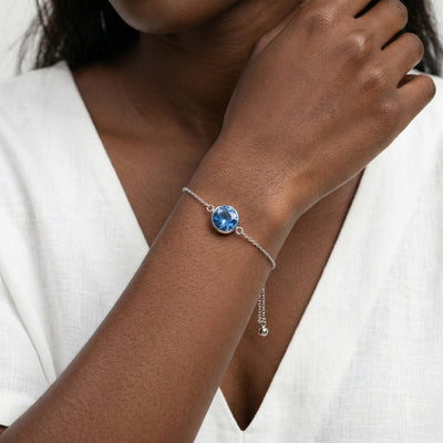 sapphire birthstone bracelet in white gold finish — model view