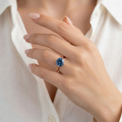 sapphire birthstone ring in rose gold finish — model view