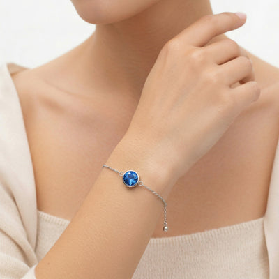 sapphire birthstone bracelet in white gold finish — model view