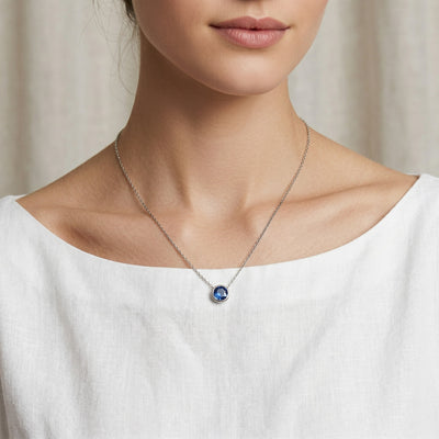 sapphire birthstone necklace in white gold finish — model view