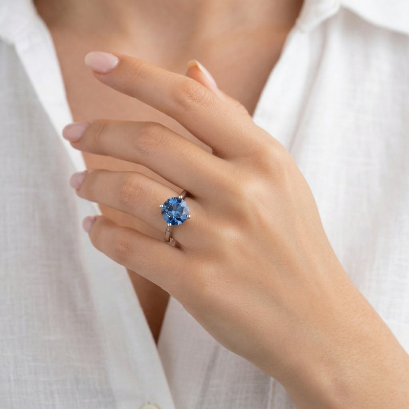 sapphire birthstone ring in white gold finish — model view