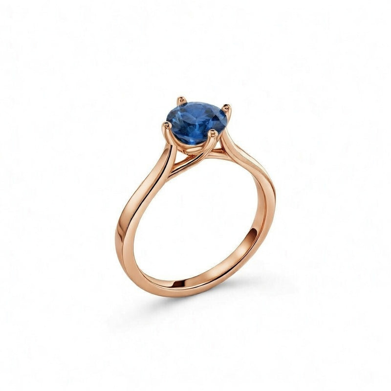 sapphire birthstone ring in rose gold finish — side view