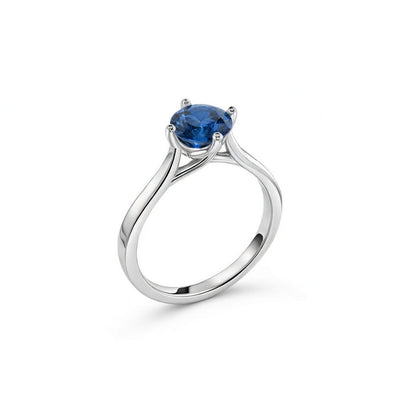 sapphire birthstone ring in white gold finish — side view