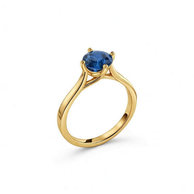 sapphire birthstone ring in yellow gold finish — side view