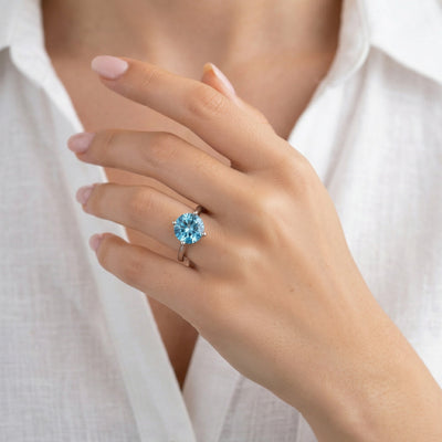 blue topaz birthstone ring in white gold finish — model view