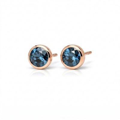Halo of Light Blue Topaz Clarity Earstuds