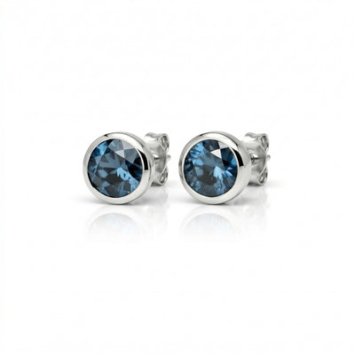 Halo of Light Blue Topaz Clarity Earstuds