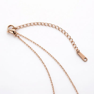 tanzanite birthstone necklace in rose gold finish — back view