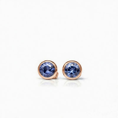 tanzanite birthstone stud earrings in rose gold finish — front view