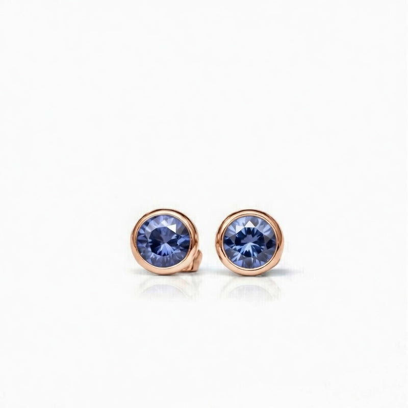 tanzanite birthstone stud earrings in rose gold finish — front view