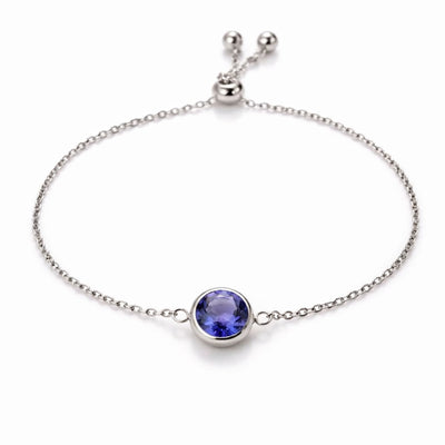 tanzanite birthstone bracelet in white gold finish — front view