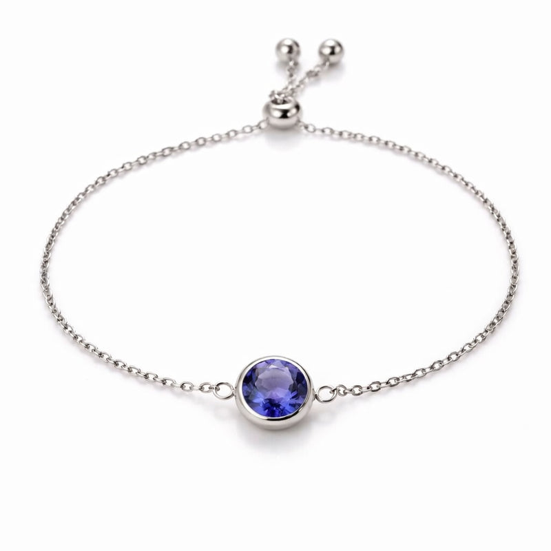 tanzanite birthstone bracelet in white gold finish — front view