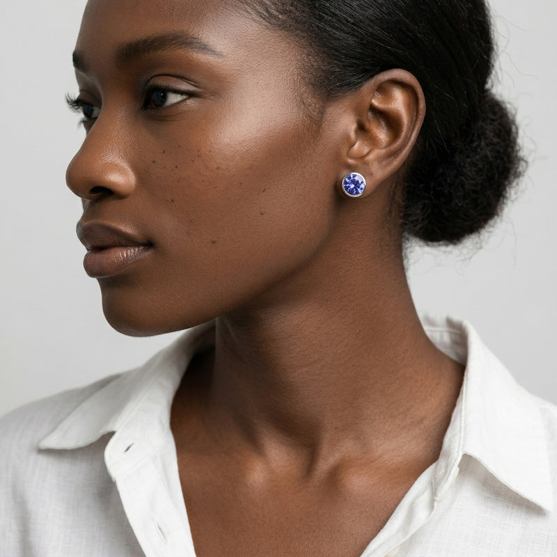 tanzanite birthstone stud earrings in white gold finish — model view