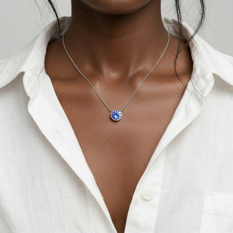 tanzanite birthstone necklace in white gold finish — model view