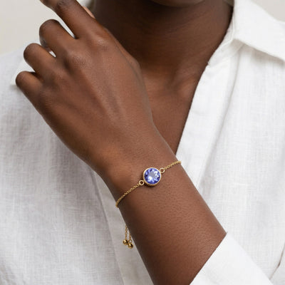 tanzanite birthstone bracelet in yellow gold finish — model view