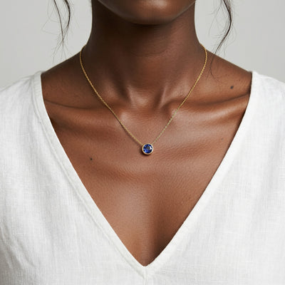 tanzanite birthstone necklace in yellow gold finish — model view