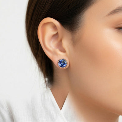 tanzanite birthstone stud earrings in rose gold finish — model view