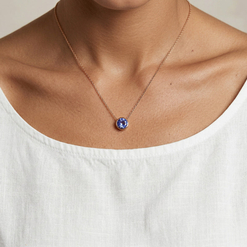 tanzanite birthstone necklace in rose gold finish — model view